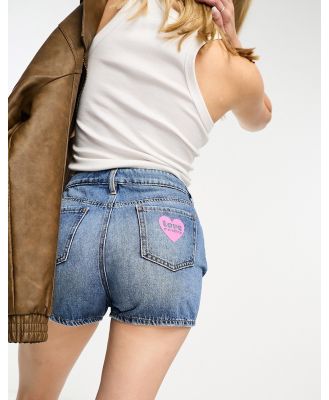 Love Moschino denim shorts with heart detail in blue wash