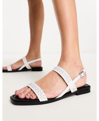 Love Moschino studded flat sandals in white