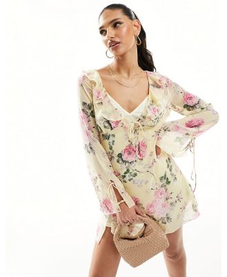 Love Triangle mini dress with ruffle detail in yellow floral
