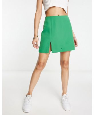 Miss Selfridge split hem mini skirt in bright green