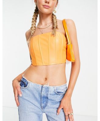 Missy Empire cropped leather look bandeau corset in orange
