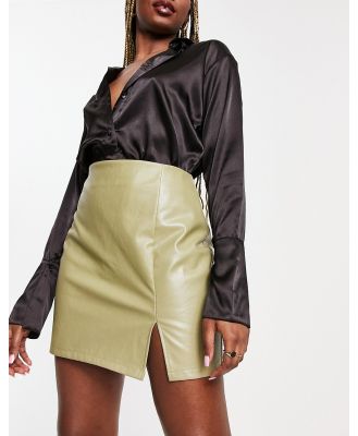 Missy Empire leather look side split mini skirt in green