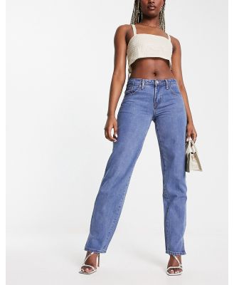 Missy Empire low rise split leg jeans in blue