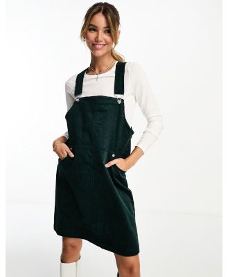 Monki cord mini dungaree dress in forest green