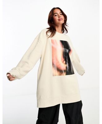 Monki oversized sweatshirt in off white with front eye print-Multi