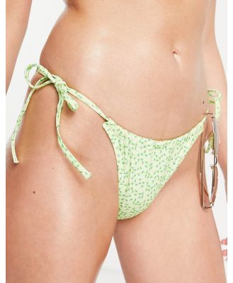 Monki ruched bikini bottoms in green floral