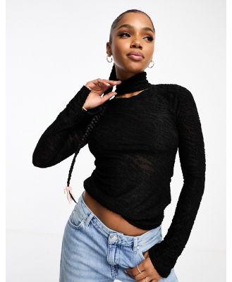 Moon River textured cut out turtle neck top in black