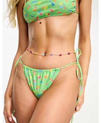 Motel Leyna tie side bikini bottoms in green floral