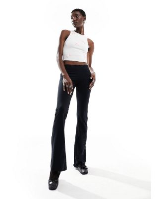Motel low waist lace trim flared pants in black