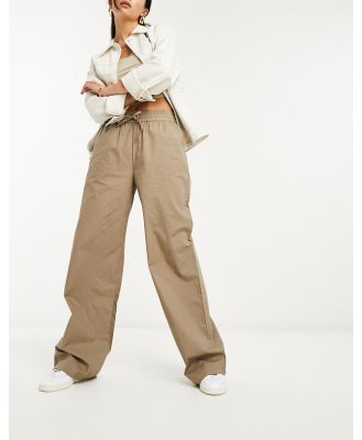 NA-KD elastic waistband baggy pants in khaki-Green