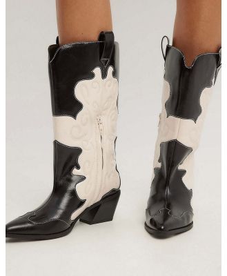 NA-KD leather western boots in black and white