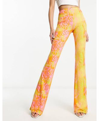 Naked Wardrobe high waist flared pants in neon snake print-Multi