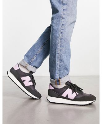 New Balance 237 sneakers in black and purple