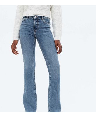 New Look Tall flared jeans in midwash blue