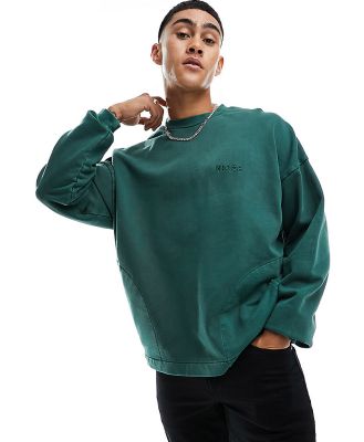 Nicce Mercury oversized sweatshirt in forest green with vintage wash