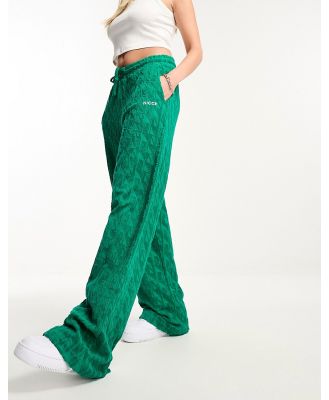Nicce Rue towelling pants in green