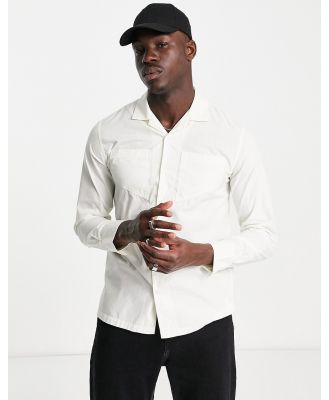 Night Addict slanted double pocket oversized fit shirt in cream-White