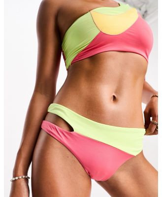 Nike Swimming Icon Swoosh Block cut out bikini bottoms in pink and green