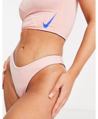 Nike Swimming Sling cheeky bikini bottoms in light pink