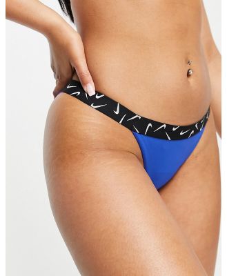 Nike Swimming Swoosh taped bikini bottoms in blue