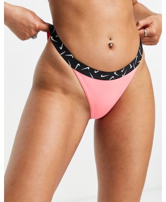 Nike Swimming Swoosh taped bikini bottoms in pink