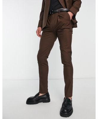 Noak wool-rich skinny suit pants in brown