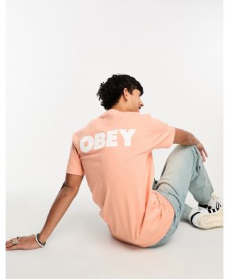 Obey bold logo back print T-shirt in orange