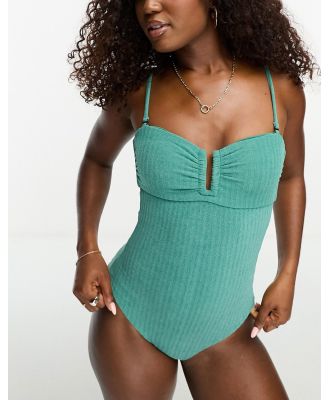 Onia towelling swimsuit with removable straps in green