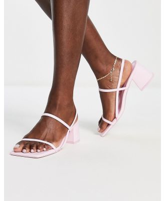 Public Desire Just Realise strappy mid heel sandals in pink PU