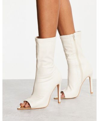 Public Desire metal toe heeled ankle boots in cream-White