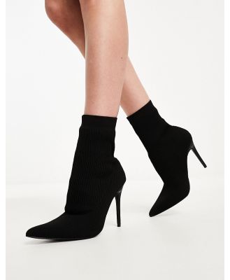 Public Desire Miraval heeled sock boots in black knit
