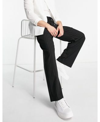 Pull & Bear smart wide leg pants with pinstripes in black