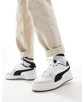 PUMA CA Pro sneakers in white and black with gum sole
