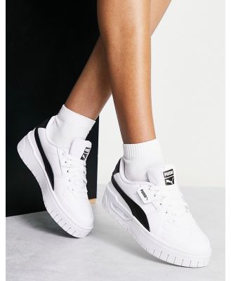 Puma Cali Dream sneakers in white and black
