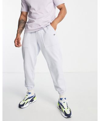 Puma Downtown trackies with checkerboard pocket in pale blue