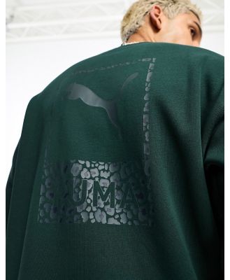 PUMA Safari back print sweatshirt in green-Black