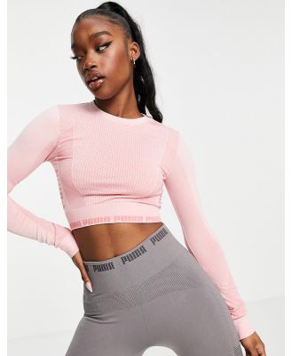PUMA Training Evoknit seamless long-sleeved crop top in soft pink
