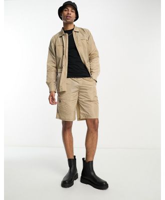 Rains nylon shorts in sand-Neutral