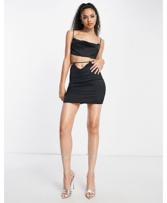 Rebellious Fashion cut out detail mini skirt in black (part of a set)