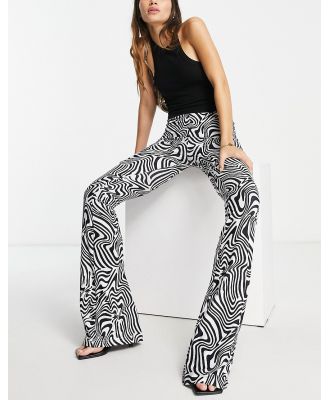 Rebellious Fashion flared pants in swirl print-Multi