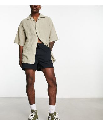 Reclaimed Vintage chino shorts in black