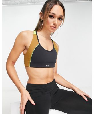 Reebok Lux mid support bra with racer back in black colour-block