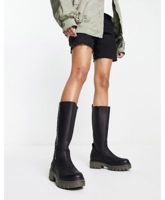 Replay chunky knee high boots in black with khaki sole