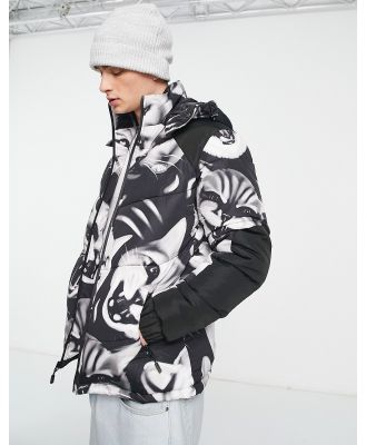 RIPNDIP neon cat hooded puffer jacket in black with all-over cat print