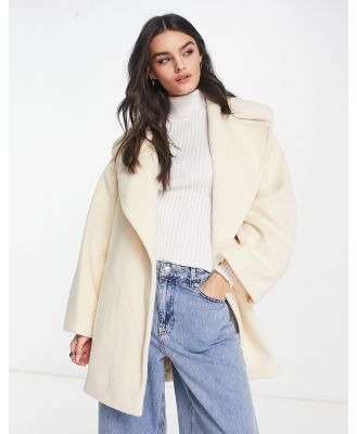 River Island belted short coat in cream-White
