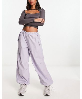 River Island low rise parachute cargo pants in lilac-Purple