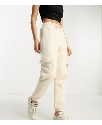 River Island Petite cargo pants with pocket detail in beige-Neutral