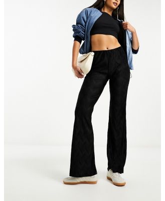 River Island plisse flare pants in black (part of a set)