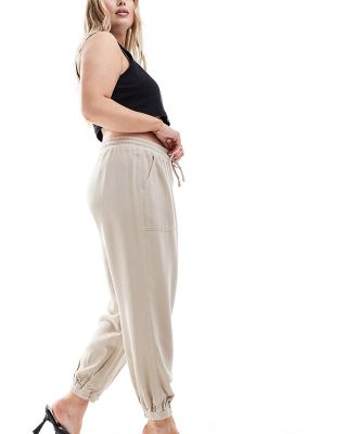 River Island Plus jersey cuffed pants in beige-Neutral