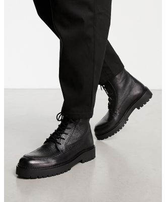 schuh Draco chunky lace up boots in black leather
